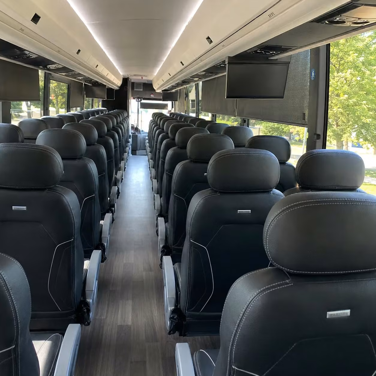 corporate charter bus rentals for team building events and off site meetings