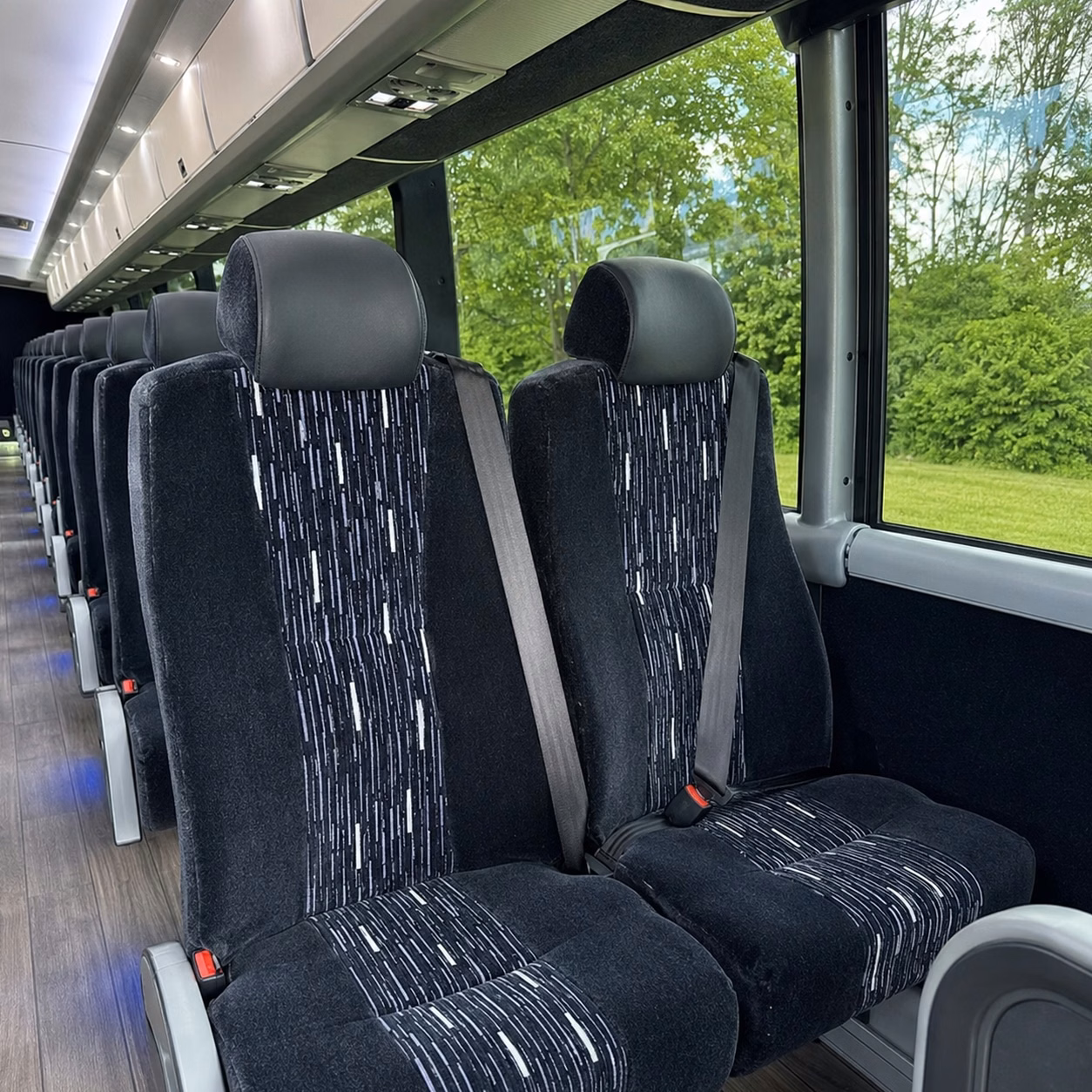 how time of year and peak season affect manchester charter bus rental prices