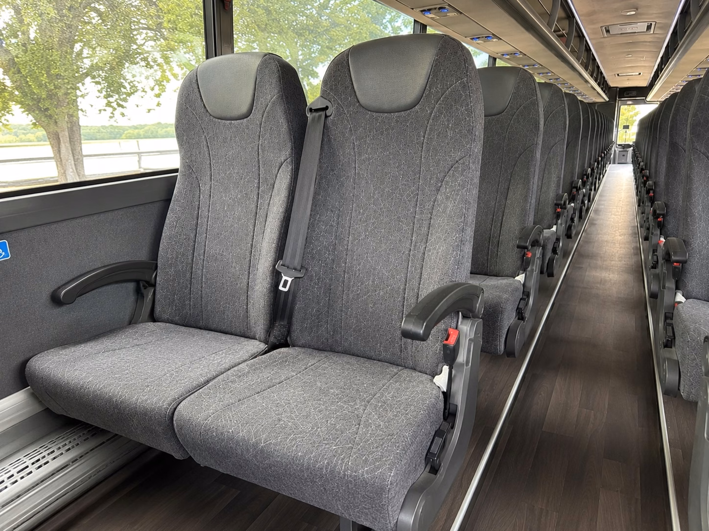 how trip distance and duration affect charter bus rental rates in manchester